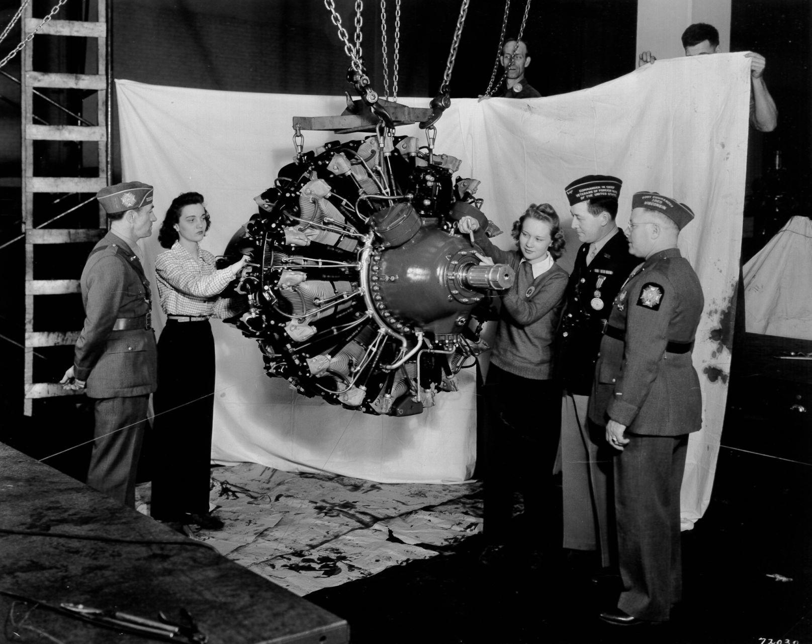 Eleanor inspecting an engine